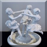 P13. White porcelain dancing girls flower holder. 